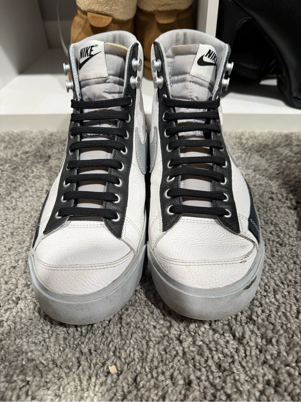 Nike White and Black High-Top Sneakers with Silver Eyelets